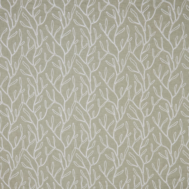 Sage green cotton fabric with white trailing leaf motif and textured weave