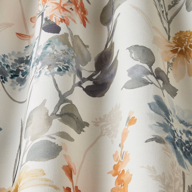 Watercolour floral cotton fabric with coral, blue-grey and olive leaves on a cream ground