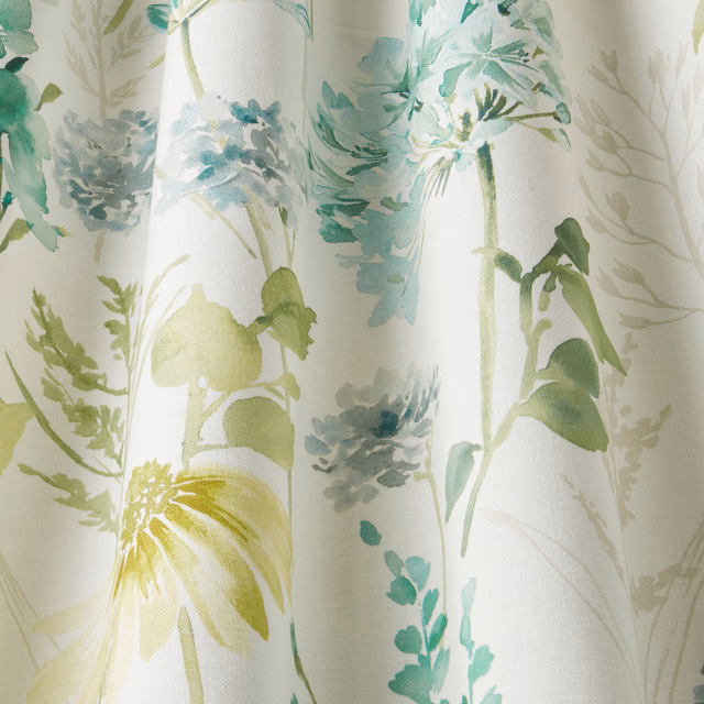 Painterly botanical cotton fabric in ivory, sage green, aqua and yellow-green leaves