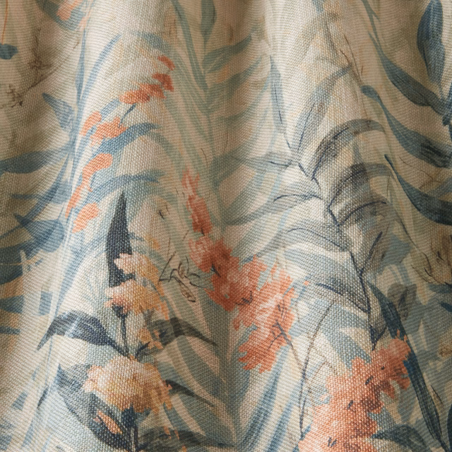 Moonstone blue cotton fabric with wavy stripes and coral wildflower print