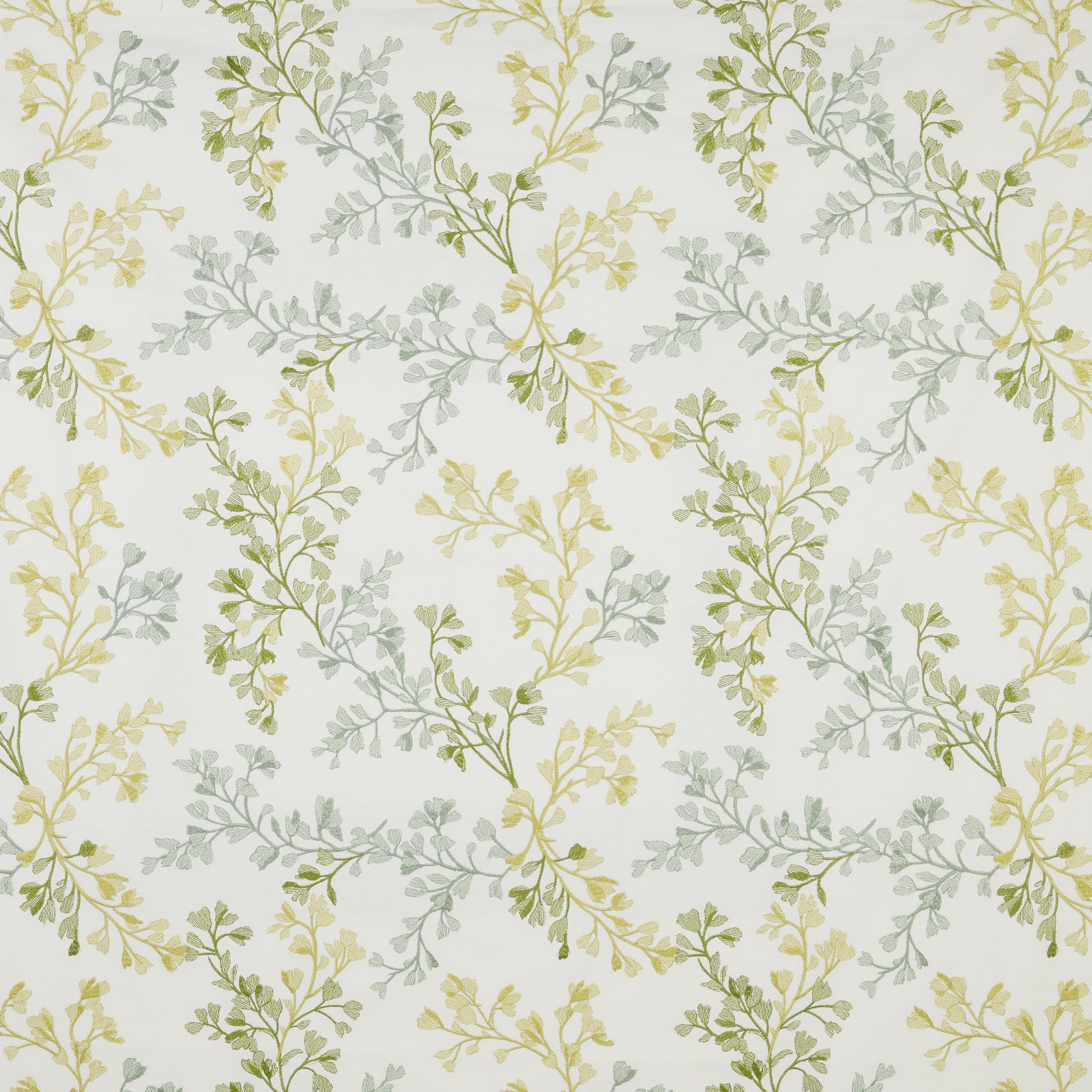 Trailing willow leaf print in soft green and pale yellow on an ivory cotton ground
