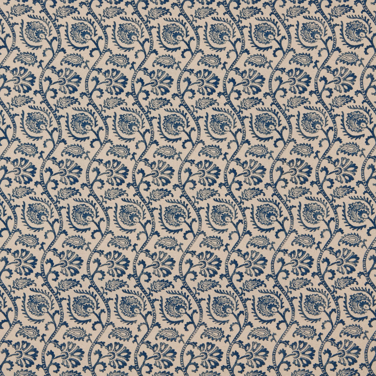Cream fabric with repeating sapphire-blue damask vine and floral motif