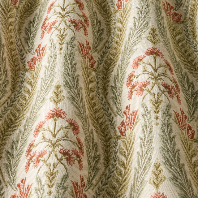 Cream woven fabric with repeating sage leaf arches and coral floral motifs