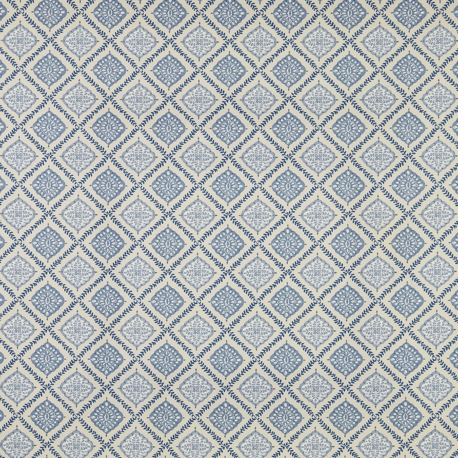 Blue diamond lattice fabric with pale embroidered-look motifs on a soft ivory ground