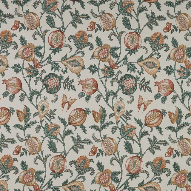 Botanical fabric with papaya fruit motifs, muted green vines and a pale ground