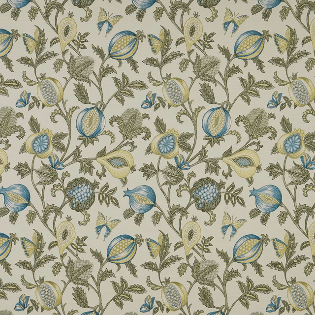 Painterly teal and blue botanical fabric with butterflies on a pale ground