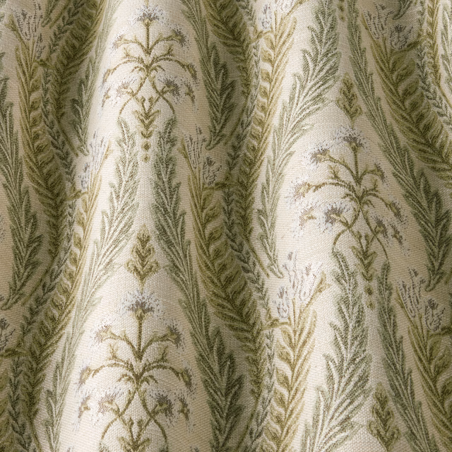 Sage green botanical woven fabric with arched trailing leaf motifs on ivory ground