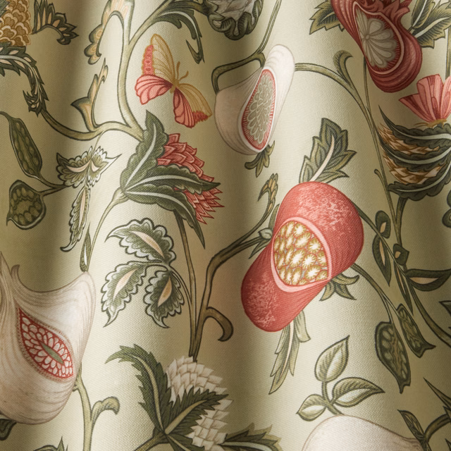 Sage green floral fabric with pink blooms and trailing vine print