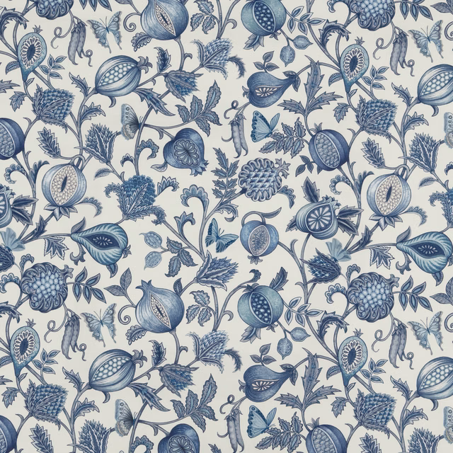 Blue botanical fabric swatch with fruiting stems on an ivory ground