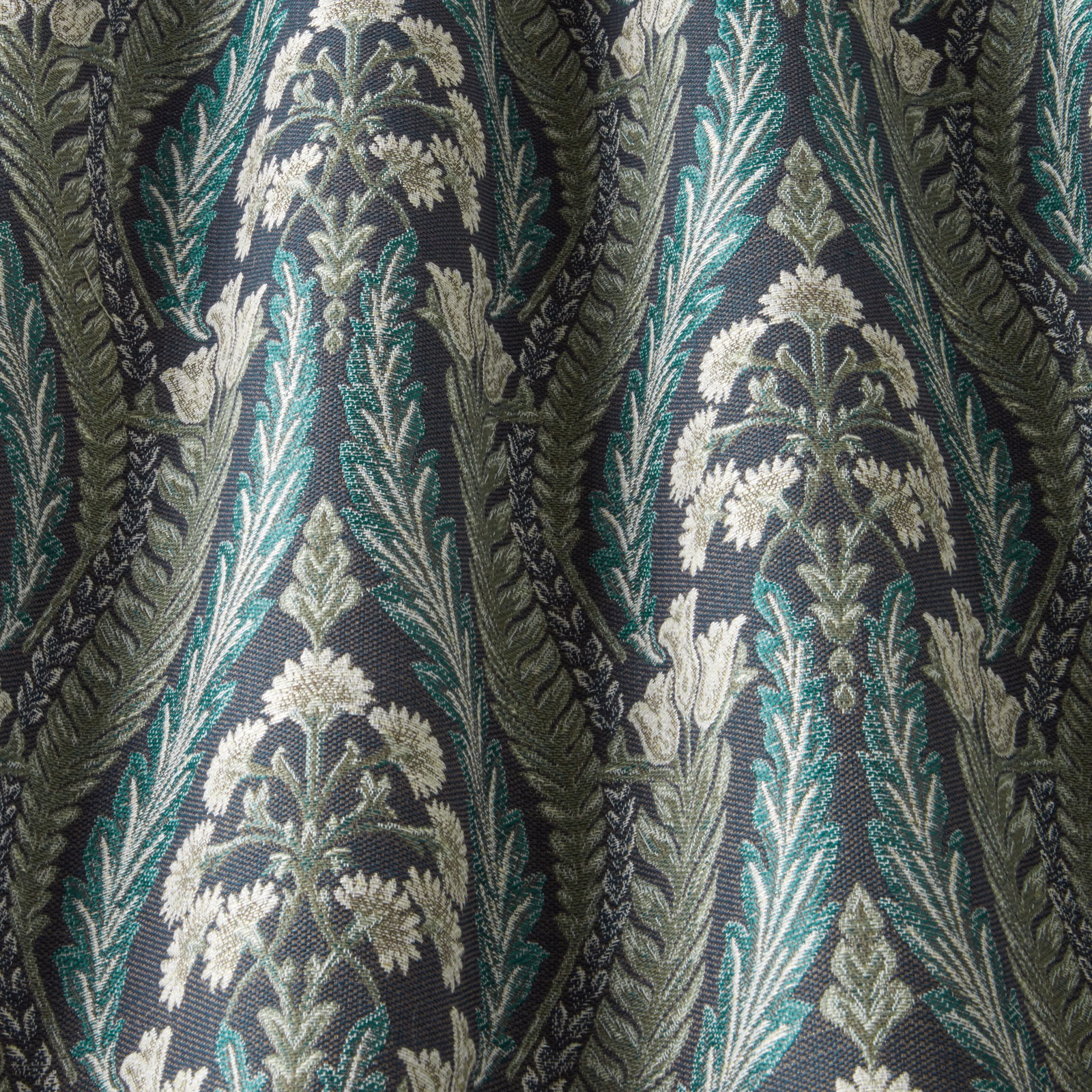Close-up of Verini Sapphire Wavy fabric with teal ground and cream botanical stripe