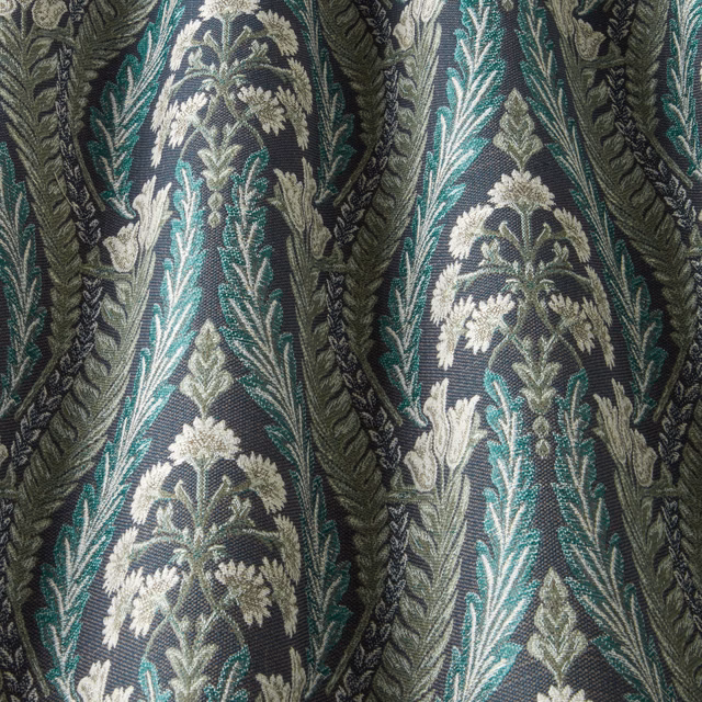 Close-up of Verini Sapphire Wavy fabric with teal ground and cream botanical stripe