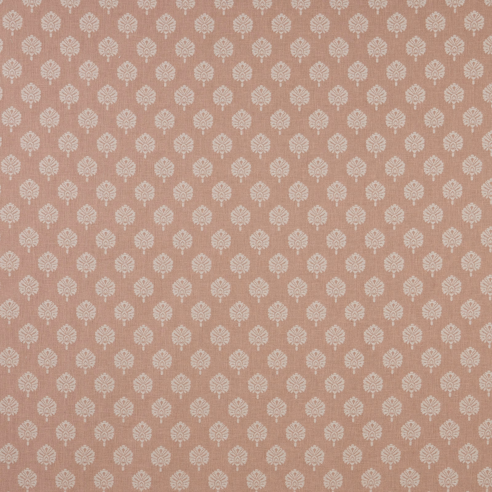 Blush pink patterned fabric with small ivory floral motifs on a flat woven ground