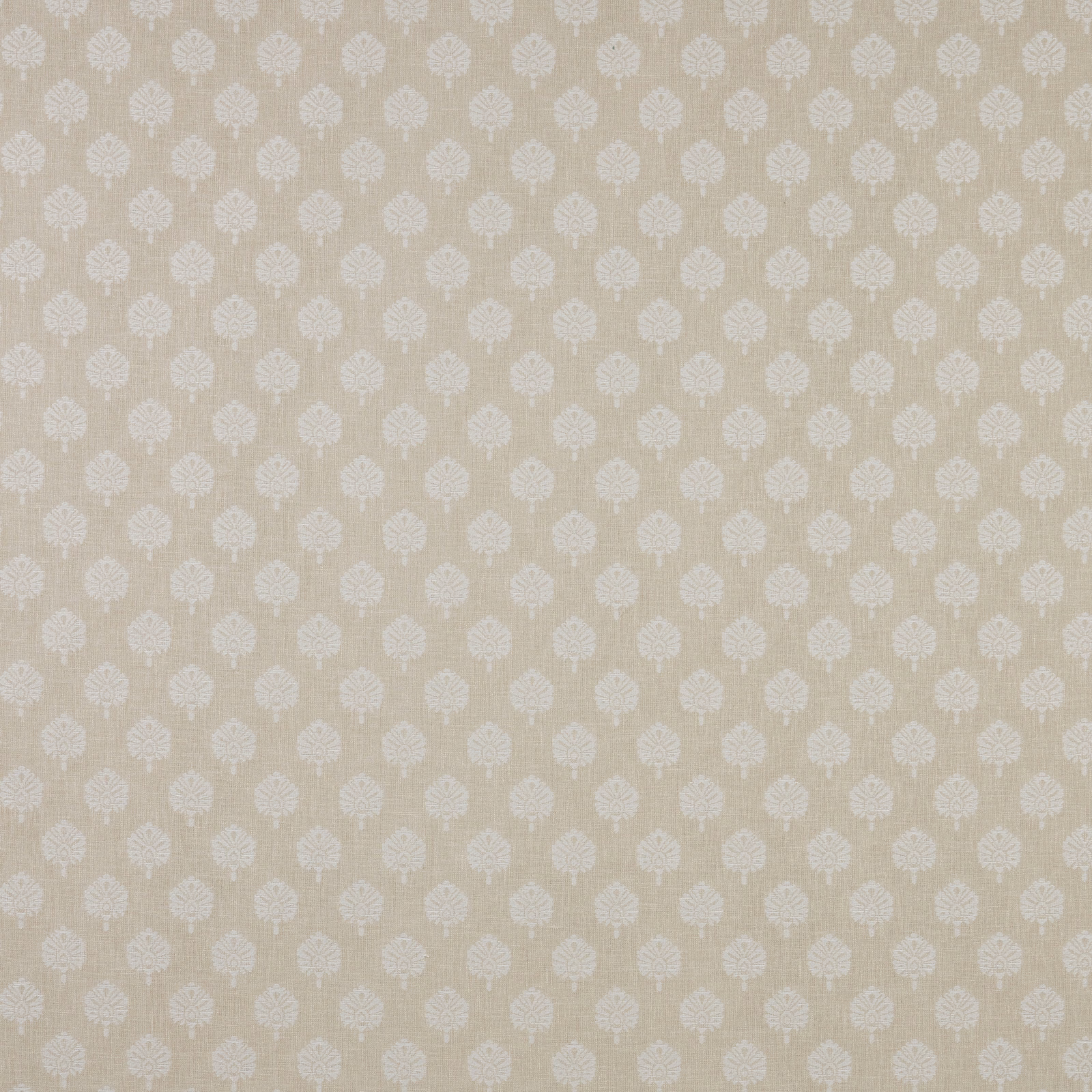 Stone beige patterned fabric with small white floral motifs and fine woven texture