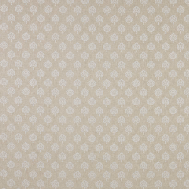 Stone beige patterned fabric with small white floral motifs and fine woven texture