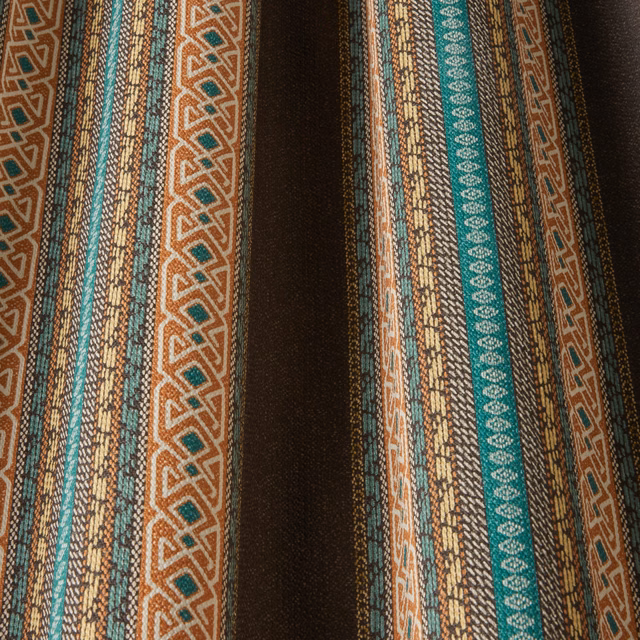 Charcoal brown woven stripe fabric with teal, rust and gold geometric bands