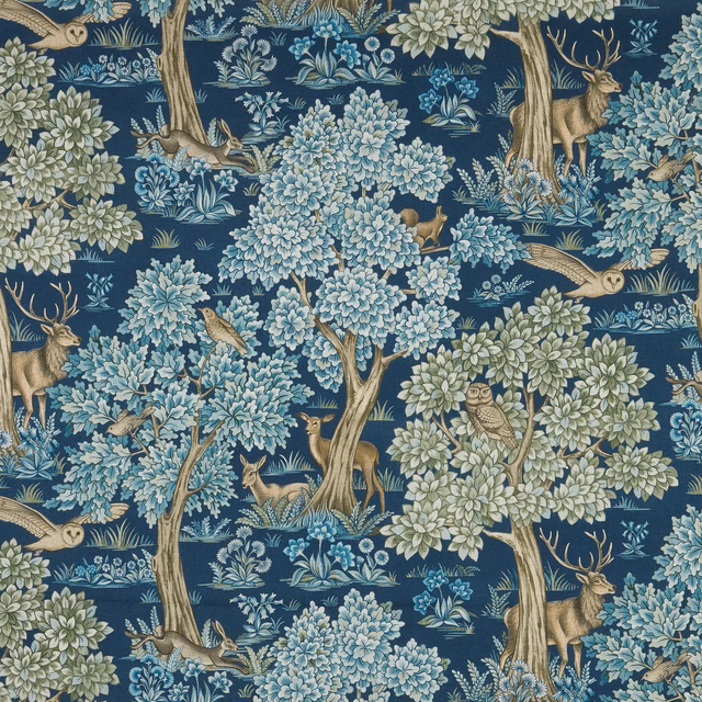 Sapphire woodland print with pale blue trees, deer and owls on navy ground