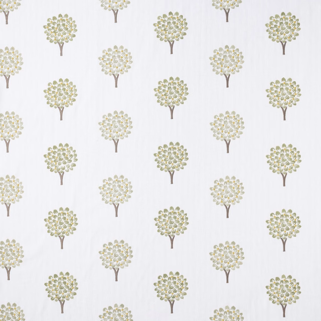 Embroidered small tree motifs in soft sage green on a pale ground