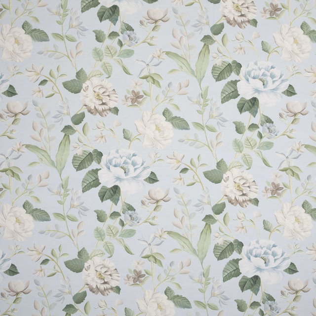 Pale aqua embroidered botanical fabric with cream flowers and sage green leaves