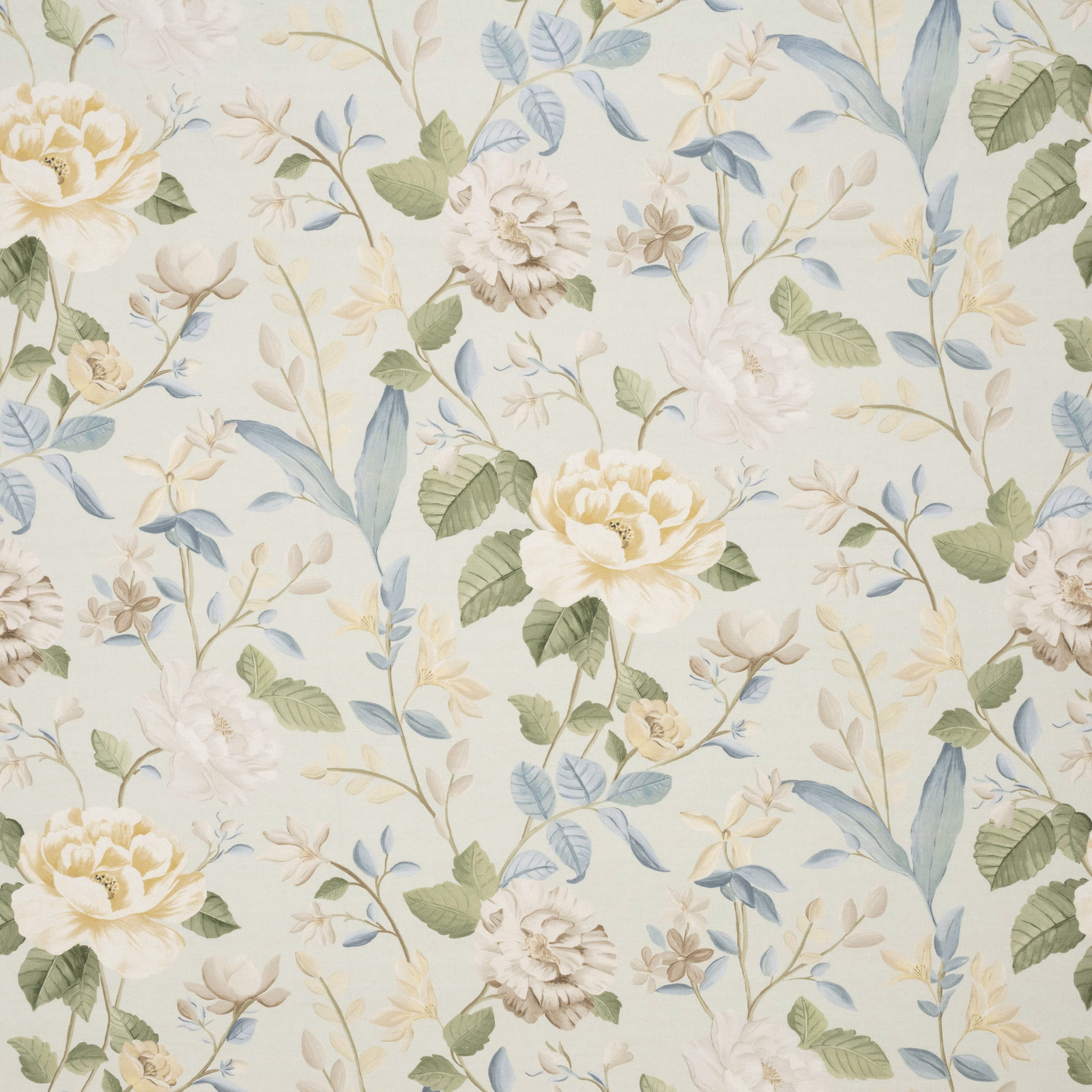 Cream floral embroidered fabric with soft green and blue leaves