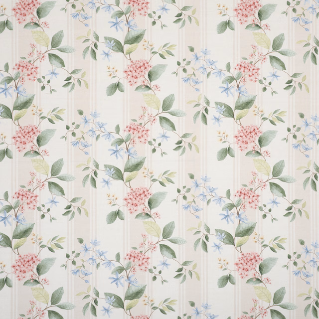 Cream embroidered fabric with pink hydrangea clusters and green leaves