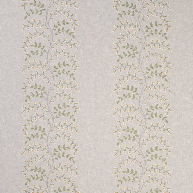 Cream embroidered fabric with trailing green leaf stripes and tiny pale blossoms