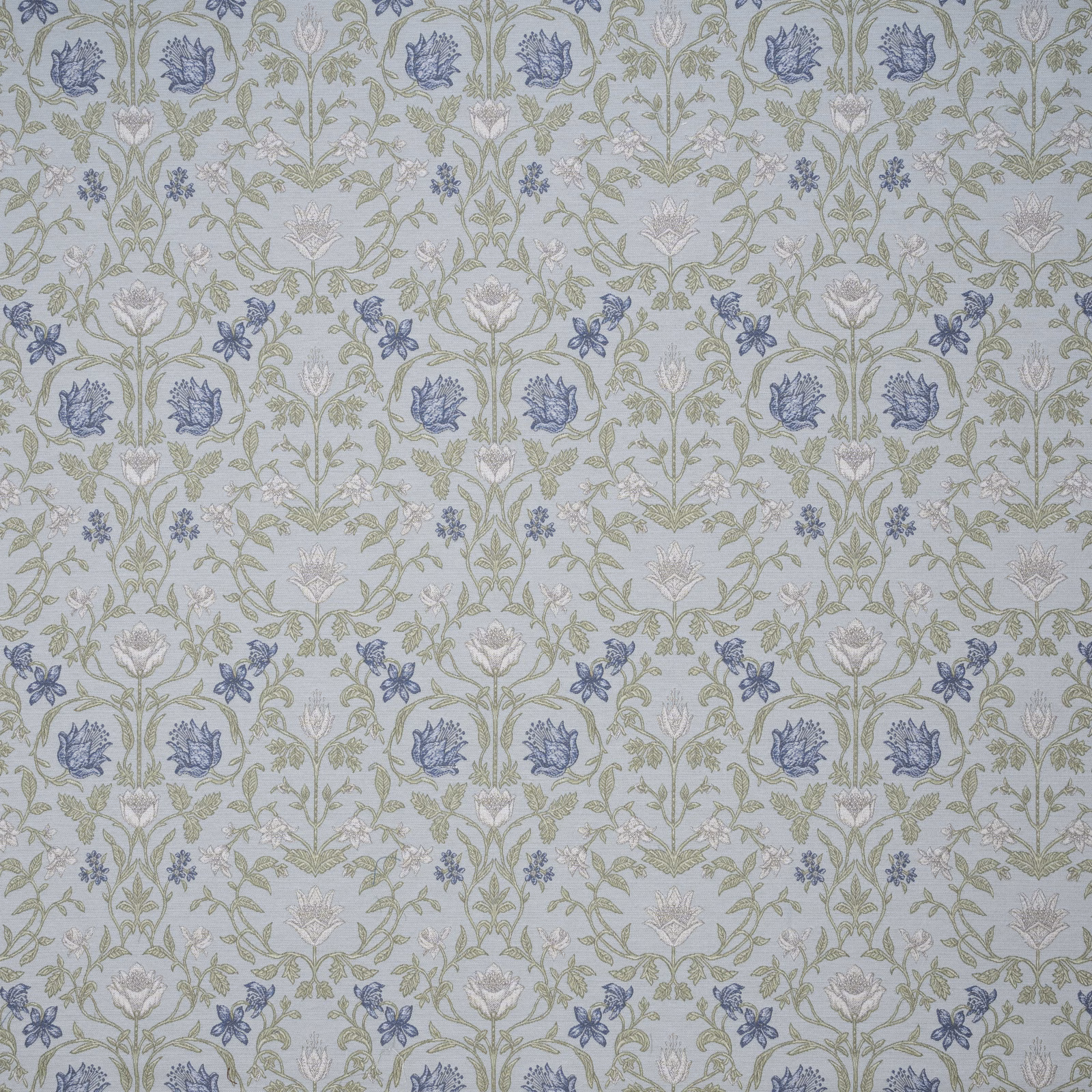 Blue-grey embroidered floral fabric with sage stems and ivory blooms