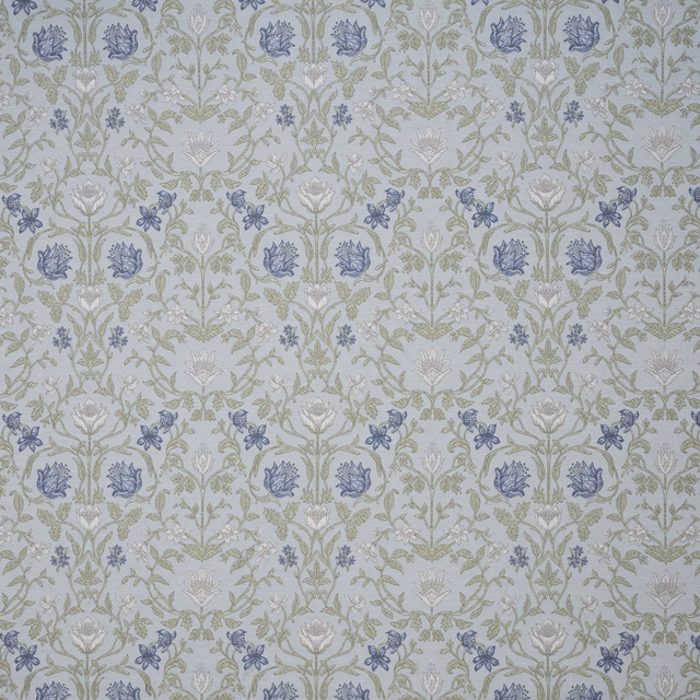 Blue-grey embroidered floral fabric with sage stems and ivory blooms