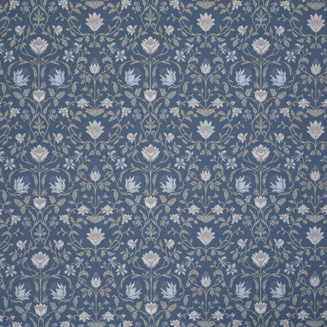Blue-teal embroidered botanical fabric with pale floral vine repeat