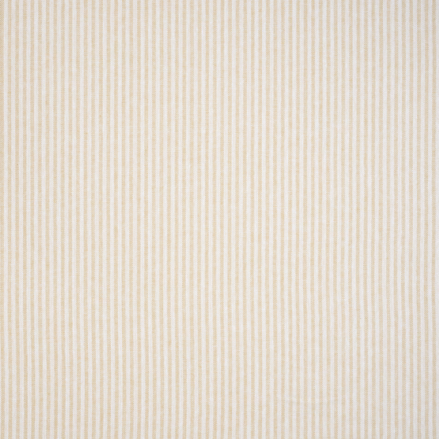 Close-up of pale cream pinstripe fabric with fine vertical stripes