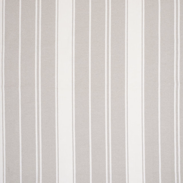 Vertical sandstone taupe stripe fabric with thin cream lines and a soft woven texture