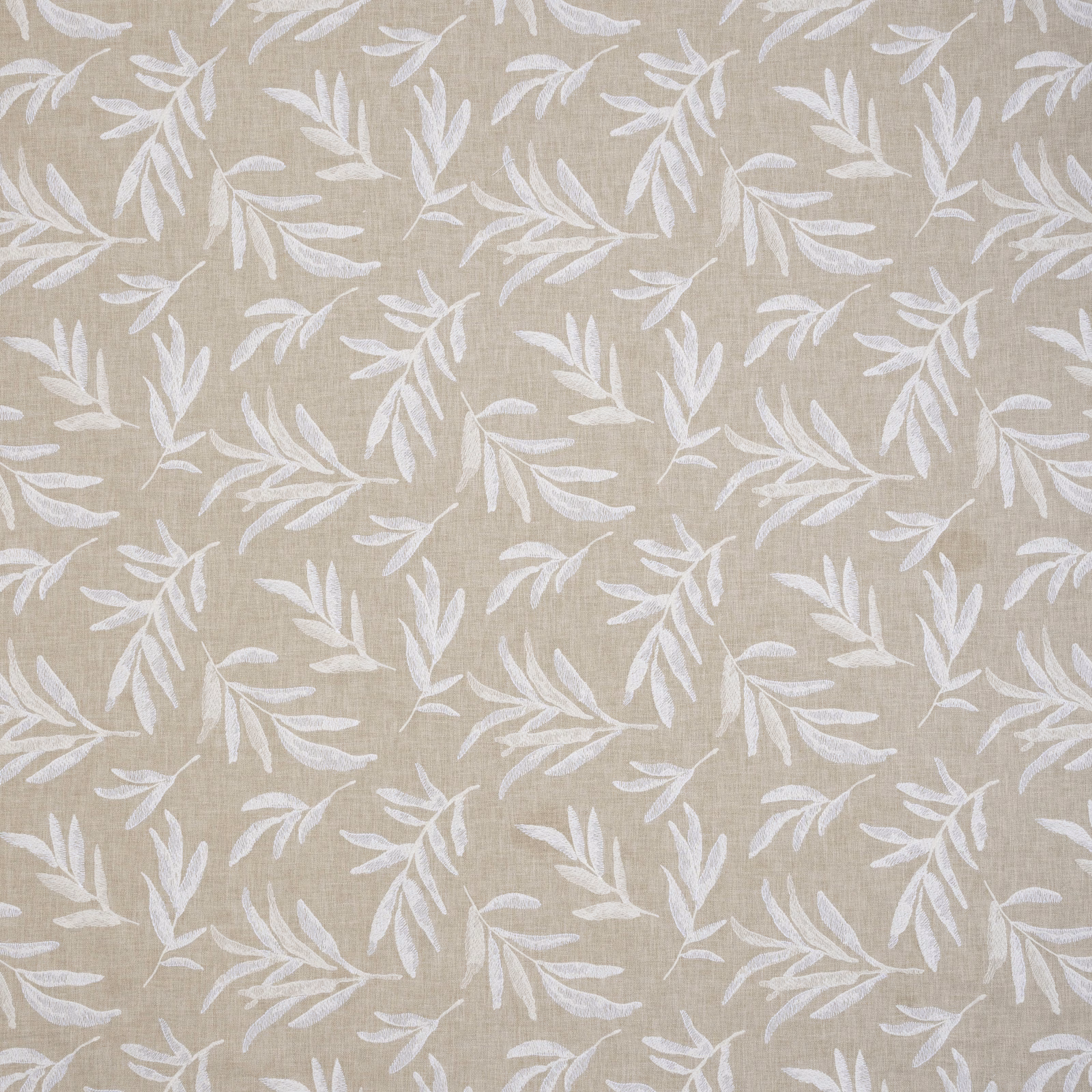 Cream botanical leaf fabric on a linen-textured ground