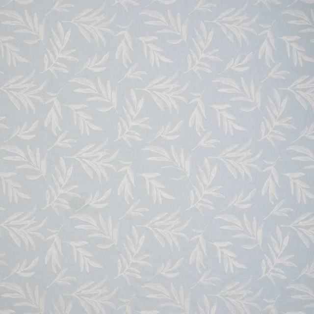 Pale seafoam botanical fabric with soft cream leaf trails and fine woven texture