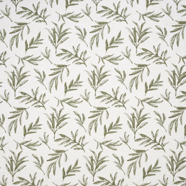 Ivory fabric with scattered willow-green leafy botanical sprigs