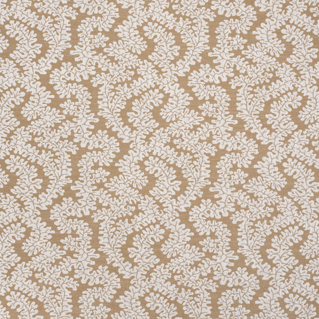 Ochre botanical woven fabric with pale ivory leaf motif on a warm beige ground