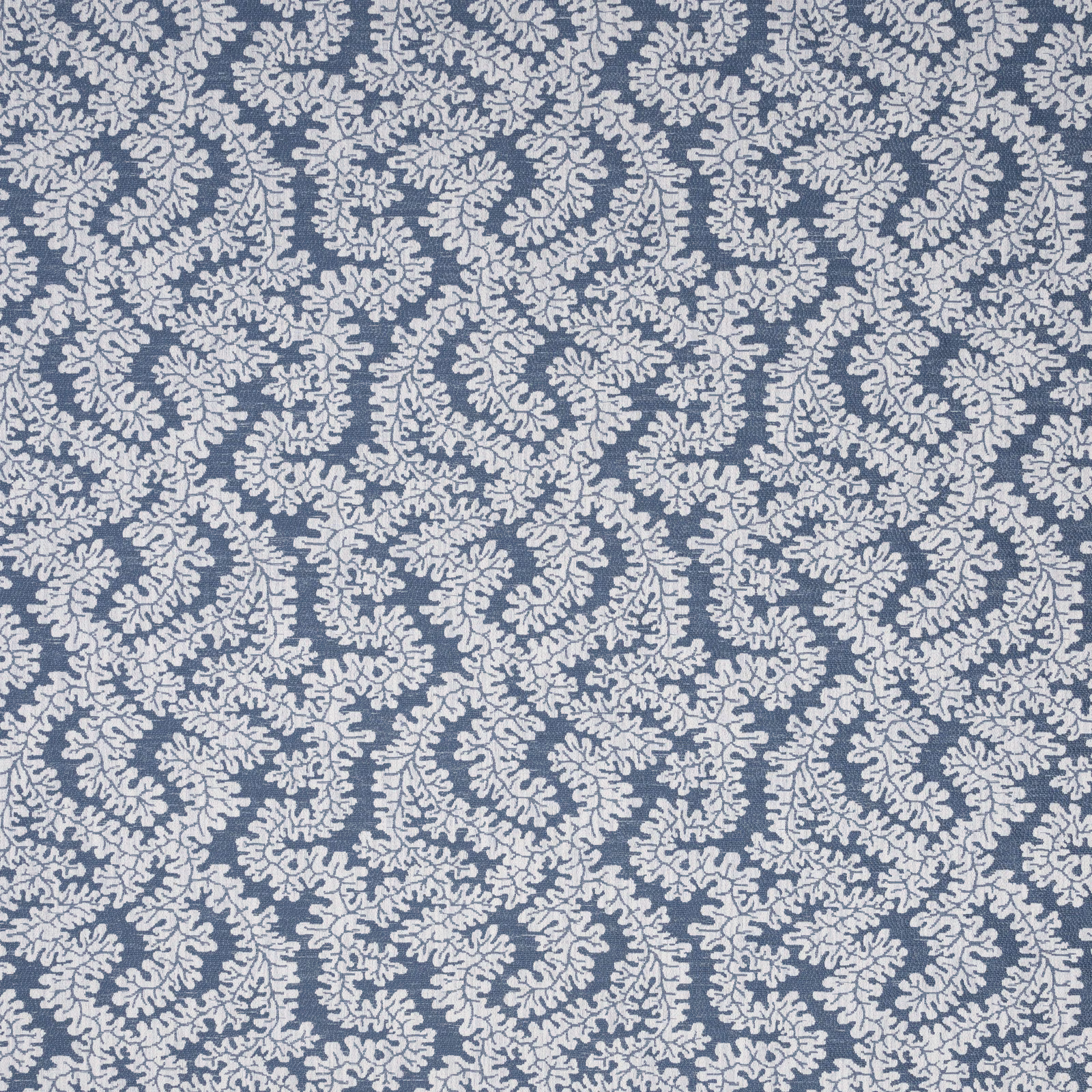 Prussian blue botanical fabric with pale ivory leaf scroll pattern