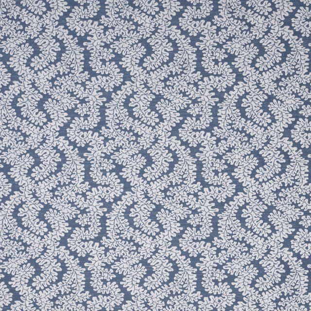 Prussian blue botanical fabric with pale ivory leaf scroll pattern