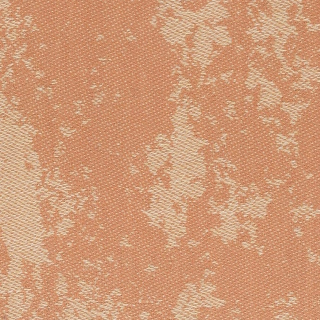 Muted blush-peach woven fabric with irregular cream abstract markings and fine tactile texture