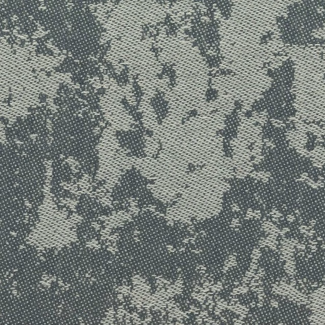 Blue-grey and sage woven fabric with irregular mottled texture and dark abstract markings