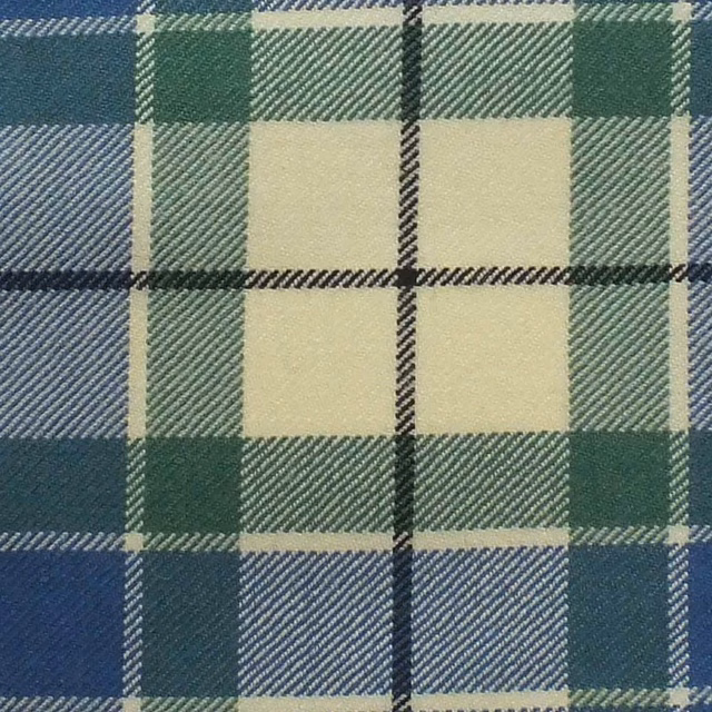 Close-up of Birnam Blue woven plaid with deep blue, green, cream and dark lines