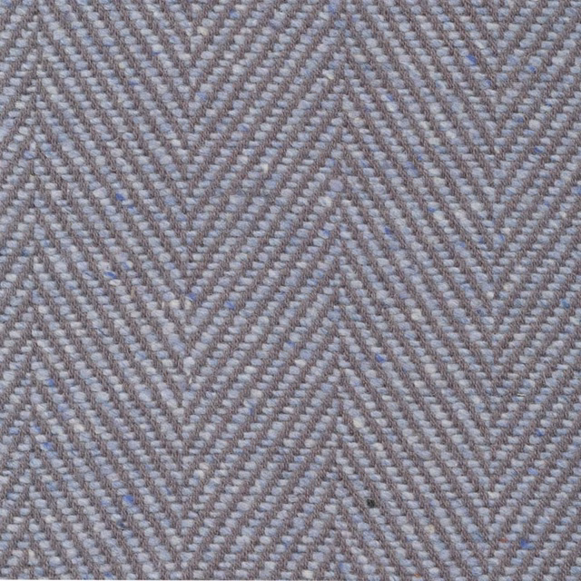 Close view of opal-grey woven chevrons with lilac and taupe threads