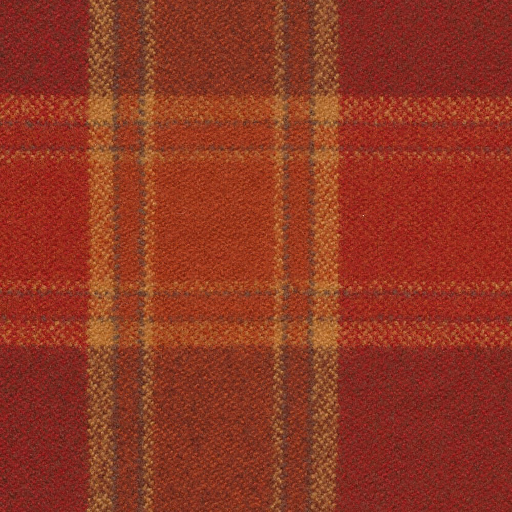 Close view of berry-red check with ochre bands and tactile woven texture