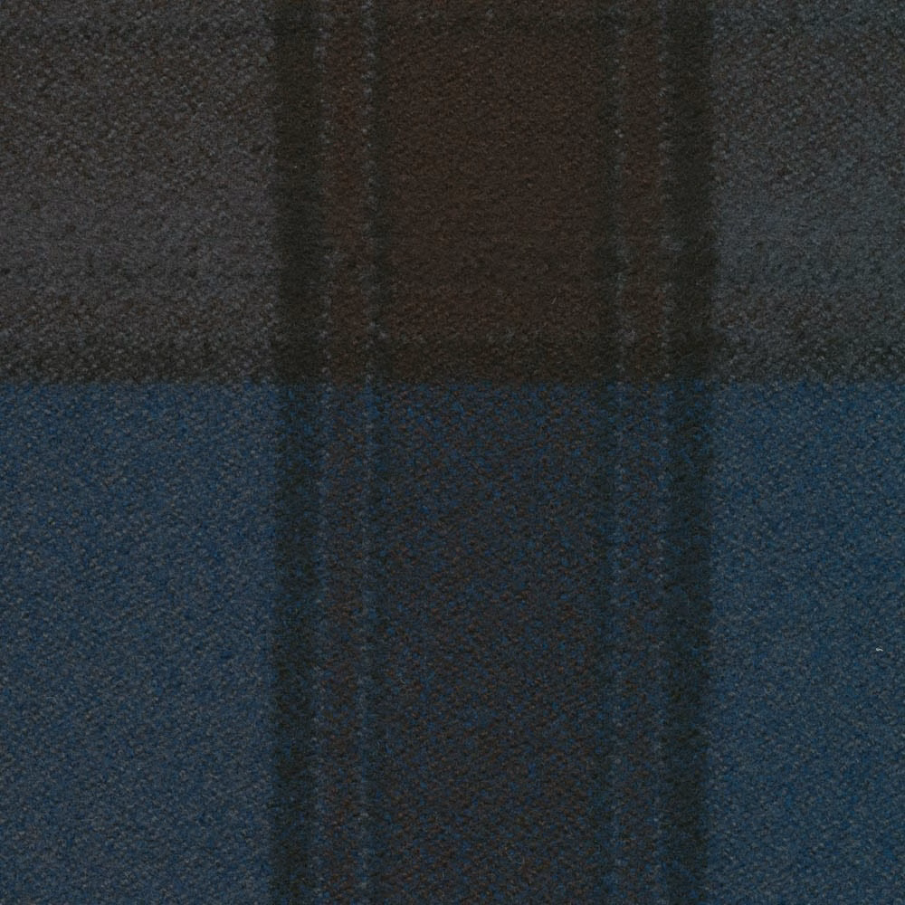 Deep teal and charcoal check with a softly textured woven surface
