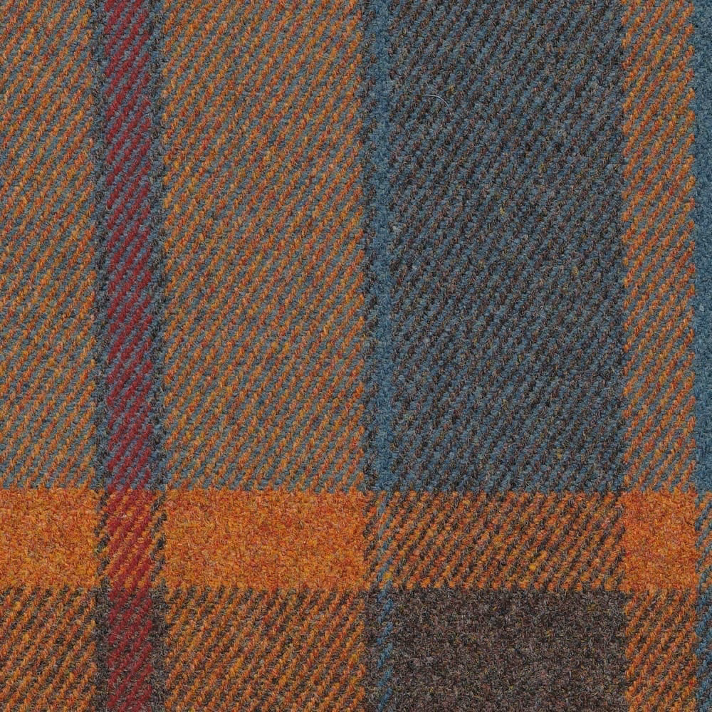 Blue-grey, rust, burgundy and charcoal plaid with a raised diagonal woven texture