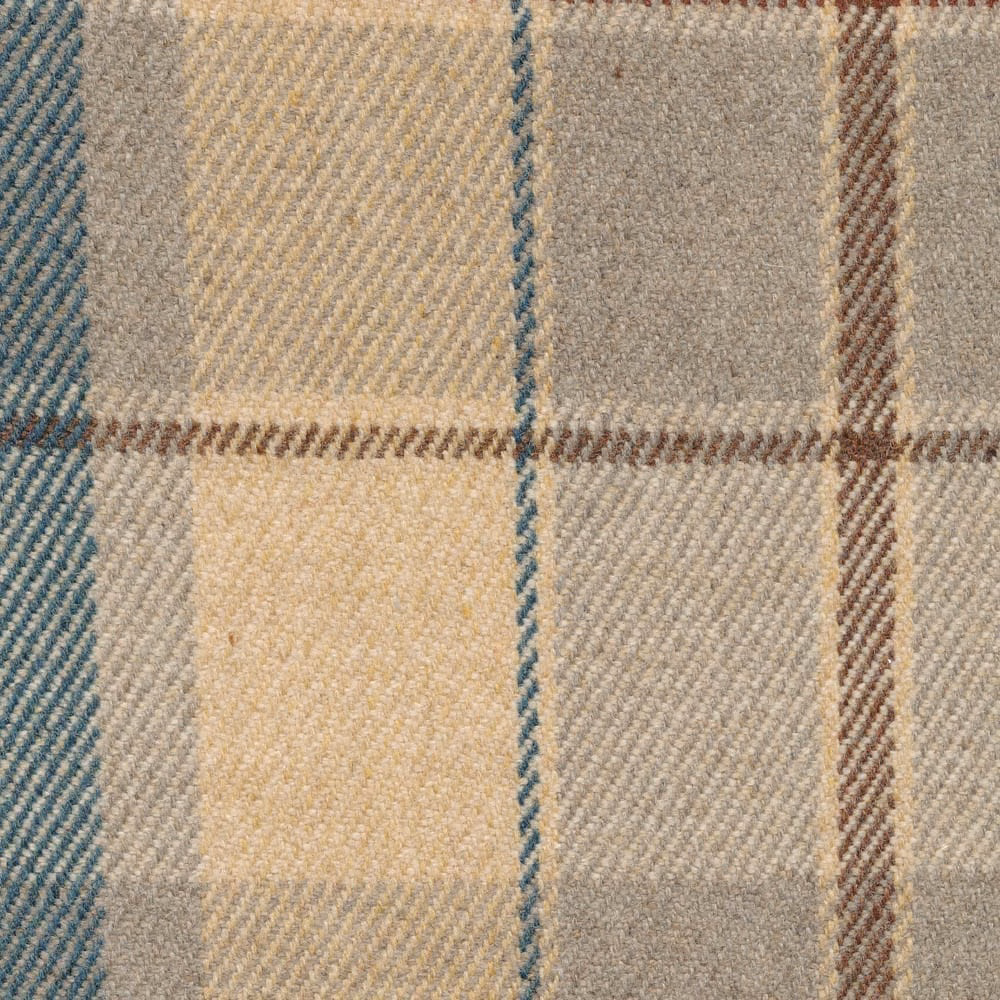 Close view of greige plaid with slate-blue and brown lines in a ridged twill weave
