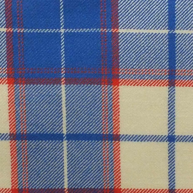 Sapphire blue plaid swatch with cream checks, red overchecks and diagonal woven texture