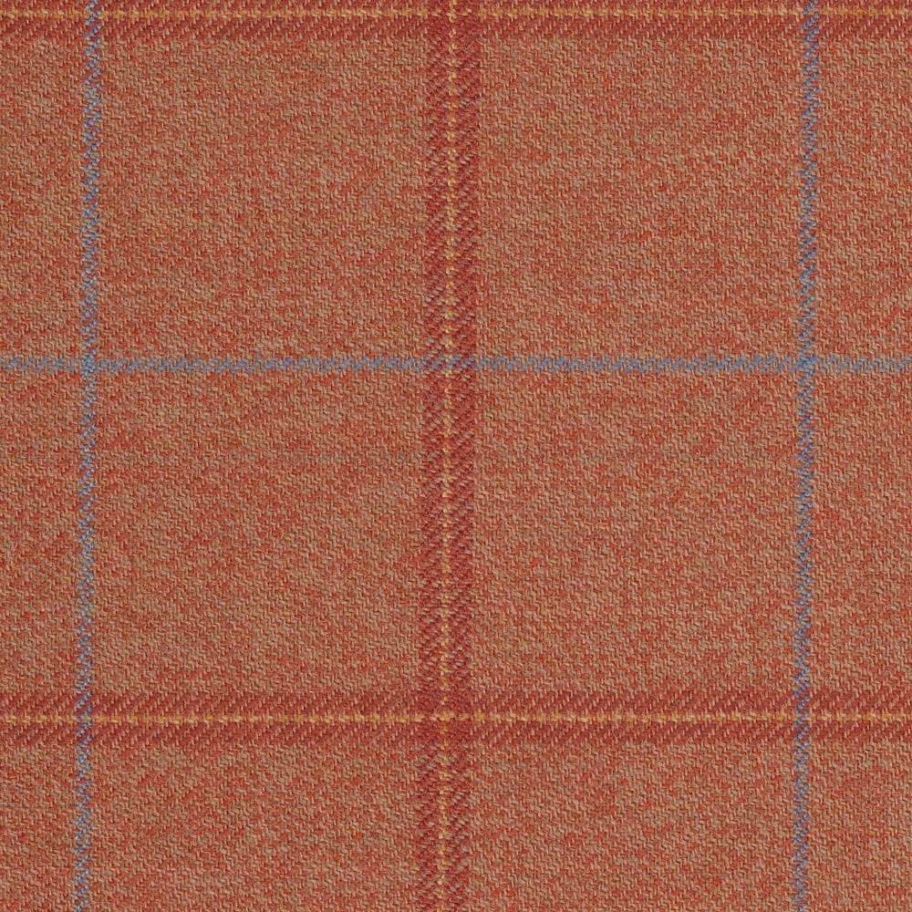 Rust terracotta plaid with blue-grey and mustard lines in a close woven texture