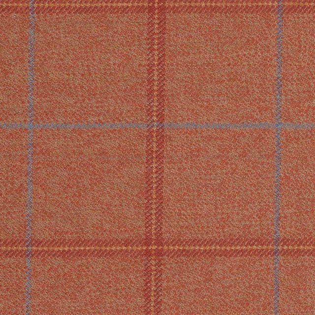 Rust terracotta plaid with blue-grey and mustard lines in a close woven texture