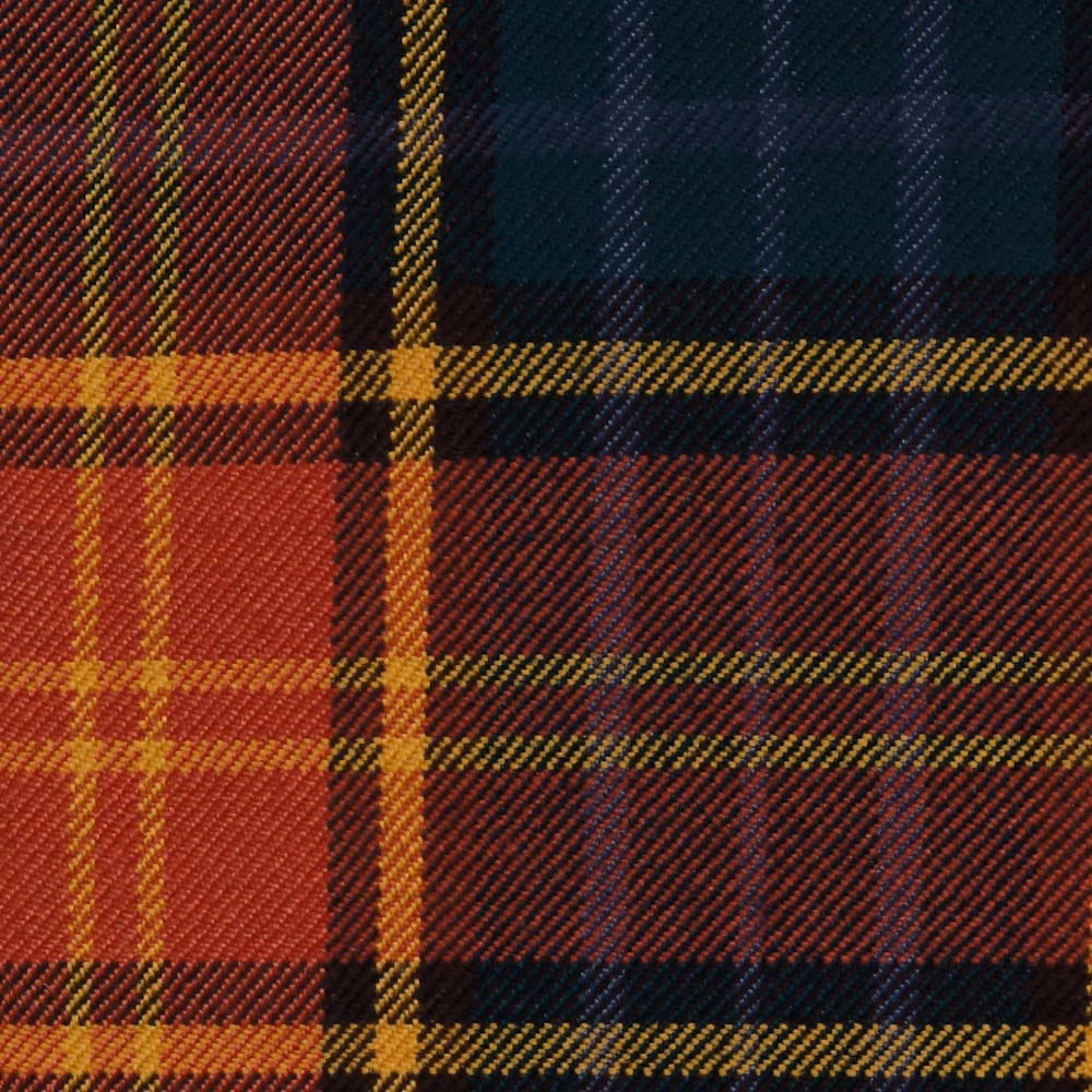 Red, teal, black and mustard tartan with a pronounced diagonal twill weave
