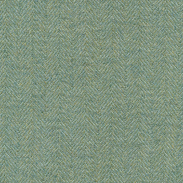 Muted lime-green fabric with blue-grey flecks and a fine diagonal woven texture