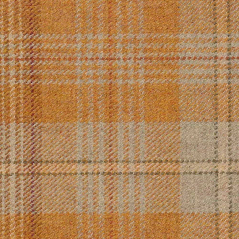 Warm ochre and rust plaid with cream and grey checks in a textured woven surface
